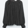 Bluse med ballongerm