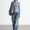 Cardigan med glidelås og turtleneck
