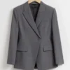 Dobbeltradet asymmetrisk blazer Dobbeltradet asymmetrisk blazer
