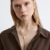 Lariat-halskjede med knutevirkel Lariat-halskjede med knutevirkel