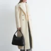 Maxikåpe i ull og shearling Maxikåpe i ull og shearling