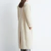 Maxikåpe i ull og shearling Maxikåpe i ull og shearling