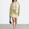 Oversized polo-strikket Cardigan Oversized polo-strikket Cardigan