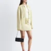 Oversized polo-strikket Cardigan Oversized polo-strikket Cardigan