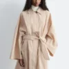 Oversized trenchcoat med nålestriper Oversized trenchcoat med nålestriper