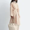 Oversized trenchcoat med nålestriper Oversized trenchcoat med nålestriper