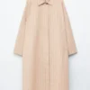 Oversized trenchcoat med nålestriper Oversized trenchcoat med nålestriper