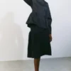 Peplum-top i bomull