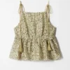 Peplum-top med volanger Peplum-top med volanger