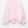 Skulpturell bomullsbluse med V-hals