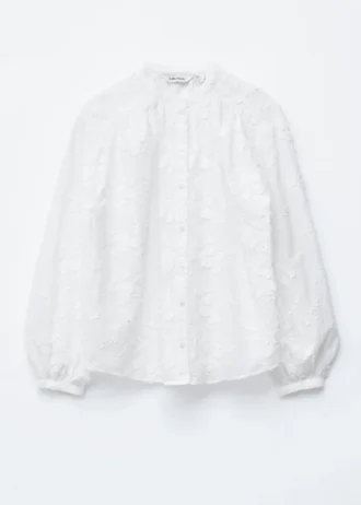 Voluminøs bluse med blomsterapplikasjon